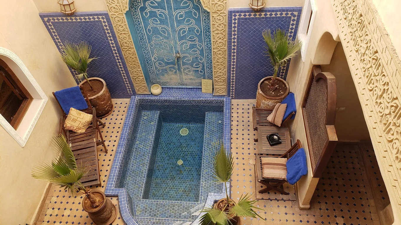 Riad Jonan traditional courtyard and rooms in Marrakech medina