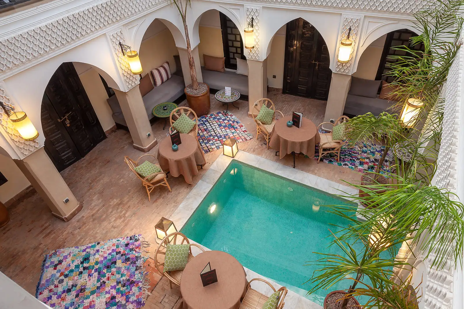 Riad Aliya rooftop terrace with Atlas Mountains view in Marrakech Kasbah